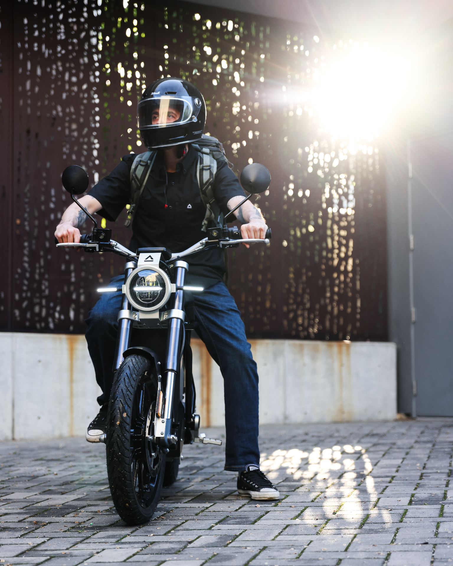 Rider on a LAND Electric motorcycle at littleBIG House, Cleveland Little Italy